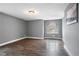 Bedroom with hardwood floors, large window, and neutral walls at 54 Cross Branches, Acworth, GA 30101