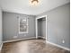 Bedroom with neutral-toned walls, hardwood floors, and closet at 54 Cross Branches, Acworth, GA 30101