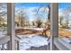 View from porch of backyard with snow on the ground at 2505 Mellville Ave, Decatur, GA 30032