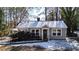 Gray house with white trim and snow covered yard at 2505 Mellville Ave, Decatur, GA 30032