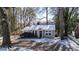 Gray house with white trim and snow covered yard at 2505 Mellville Ave, Decatur, GA 30032