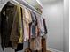 Walk-in closet features clothing rack, shelves, and organized storage space at 395 Pharr Ne Rd # 207, Atlanta, GA 30305