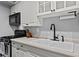Well-equipped kitchen featuring stainless steel appliances and ample counter space at 395 Pharr Ne Rd # 207, Atlanta, GA 30305