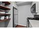 Compact kitchenette with stainless steel appliances and practical storage solutions at 395 Pharr Ne Rd # 207, Atlanta, GA 30305