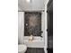 Bathroom with black and white marble hexagon tile and modern fixtures at 7110 Brandon Mill, Sandy Springs, GA 30328