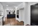 Bright kitchen with white cabinetry and view to the kitchen island at 7110 Brandon Mill, Sandy Springs, GA 30328