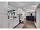 Bright kitchen with white cabinets, stainless steel appliances and hardwood floors at 7110 Brandon Mill, Sandy Springs, GA 30328