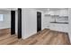 This quaint kitchenette offers sleek cabinets, subway tile backsplash, and modern fixtures at 7110 Brandon Mill, Sandy Springs, GA 30328