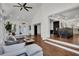 Open living room with sunroom area and view into the kitchen at 7110 Brandon Mill, Sandy Springs, GA 30328