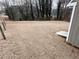 Large backyard with dormant grass at 803 Plantation Ridge Overlook, Woodstock, GA 30188