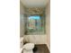 Modern bathroom with sliding glass shower door at 1054 Ira Sw St, Atlanta, GA 30310