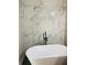 Relaxing bathroom with freestanding soaking tub at 1054 Ira Sw St, Atlanta, GA 30310