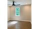 Bright bedroom with hardwood floors and ceiling fan at 1054 Ira Sw St, Atlanta, GA 30310