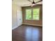 Bedroom with hardwood floors and double door closet at 1054 Ira Sw St, Atlanta, GA 30310