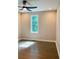 Well-lit bedroom with hardwood floors and a large window at 1054 Ira Sw St, Atlanta, GA 30310