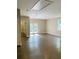 Spacious bonus room with hardwood floors and access to deck at 1054 Ira Sw St, Atlanta, GA 30310