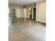 Large bonus room with hardwood floors and multiple doors at 1054 Ira Sw St, Atlanta, GA 30310