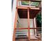 Elevated deck with wooden railings and access from the home's exterior at 1054 Ira Sw St, Atlanta, GA 30310