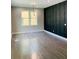 Bright dining room with hardwood floors and a statement wall at 1054 Ira Sw St, Atlanta, GA 30310