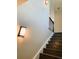 Elegant staircase with dark wood and modern lighting at 1054 Ira Sw St, Atlanta, GA 30310