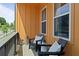 Private balcony with two chairs and a view of the neighborhood at 2036 Bixby Byway Se Dr, Atlanta, GA 30317