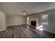 Finished basement offers neutral walls, stylish wood floors and fireplace at 3640 Autumn View Nw Dr, Acworth, GA 30101
