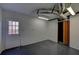 Basement flex space featuring a door to the exterior and a separate storage closet at 3640 Autumn View Nw Dr, Acworth, GA 30101