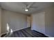 Bedroom featuring a ceiling fan and a closet with white bi-fold doors at 3640 Autumn View Nw Dr, Acworth, GA 30101