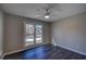 Bedroom with a large window that offers great natural light and a ceiling fan at 3640 Autumn View Nw Dr, Acworth, GA 30101