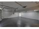 Spacious garage with epoxy floors and built-in shelving at 3640 Autumn View Nw Dr, Acworth, GA 30101