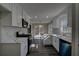Beautiful kitchen with white cabinets, stainless steel appliances, and stunning countertops at 3640 Autumn View Nw Dr, Acworth, GA 30101