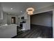 Lovely kitchen featuring stainless steel appliances, stylish chandelier and abundant natural light at 3640 Autumn View Nw Dr, Acworth, GA 30101