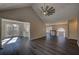 Open-concept living room showcasing wood floors, modern fan and ample natural light at 3640 Autumn View Nw Dr, Acworth, GA 30101