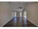 Spacious living room featuring wood floors, vaulted ceilings and abundant natural light at 3640 Autumn View Nw Dr, Acworth, GA 30101