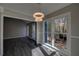 Sunroom with hardwood floors, neutral walls, lots of natural light, and access to the back yard at 3640 Autumn View Nw Dr, Acworth, GA 30101