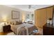Relaxing bedroom with hardwood floors, neutral tones, and ample closet space at 491 Monument Se Ave, Atlanta, GA 30316