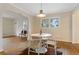 Dining area with white table and chairs, and hardwood floors at 491 Monument Se Ave, Atlanta, GA 30316