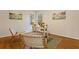 Bright home office features hardwood floors, two chairs, and a workspace with natural light at 491 Monument Se Ave, Atlanta, GA 30316