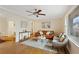 Bright living room with hardwood floors, comfy seating, and large windows at 491 Monument Se Ave, Atlanta, GA 30316