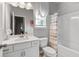 Small bathroom with a tub, shower, and white vanity at 205 Bastian Dr # 2, Villa Rica, GA 30180