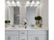 Double vanity bathroom with white cabinets and quartz countertops at 205 Bastian Dr # 2, Villa Rica, GA 30180