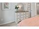 Bedroom featuring a white dresser and a peach comforter at 205 Bastian Dr # 2, Villa Rica, GA 30180