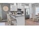 White kitchen with stainless steel appliances and granite countertops at 205 Bastian Dr # 2, Villa Rica, GA 30180