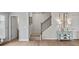 Modern staircase with metal balusters and neutral carpeting at 205 Bastian Dr # 2, Villa Rica, GA 30180