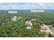 Fairburn, GA aerial view showcases home's location near Le Jardin Blvd and Cascade Palmetto Hwy, surrounded by trees at 4267 Matisse Ln, Fairburn, GA 30213