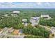 Fairburn, GA aerial view of the home's location close to Ridge Rd and Town Creek amidst a lush, green landscape at 4267 Matisse Ln, Fairburn, GA 30213