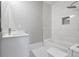 Bathroom featuring a white vanity, sleek faucet, a bathtub and shower combination, and ceramic tiled floors at 4267 Matisse Ln, Fairburn, GA 30213