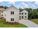 Exterior of a spacious white brick home with a well-manicured lawn and inviting curb appeal at 4267 Matisse Ln, Fairburn, GA 30213