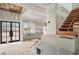 Interior view with stairs and large window to the outside at 4267 Matisse Ln, Fairburn, GA 30213