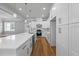 Spacious kitchen with stainless steel appliances, a center island, and hardwood flooring at 4267 Matisse Ln, Fairburn, GA 30213